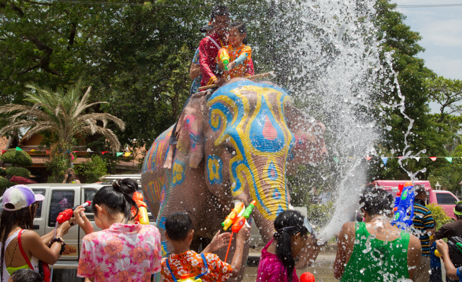 The vibrant scene of Songkran’s water splashing
