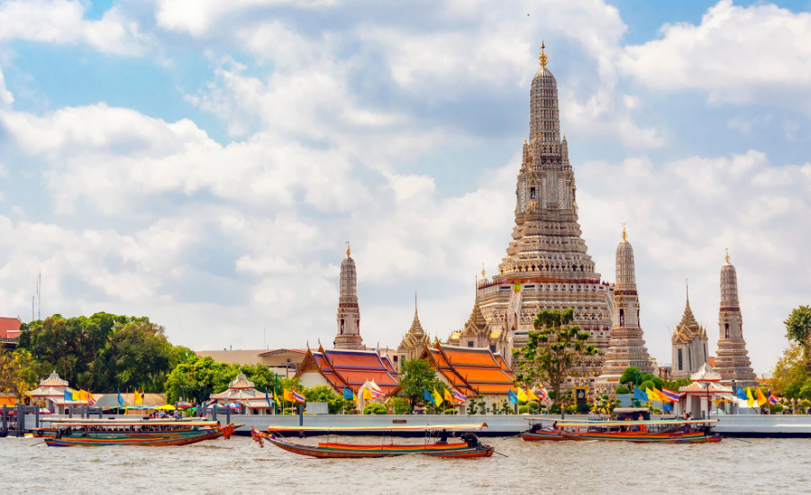 Wat Arun beside along the Chao Phraya River